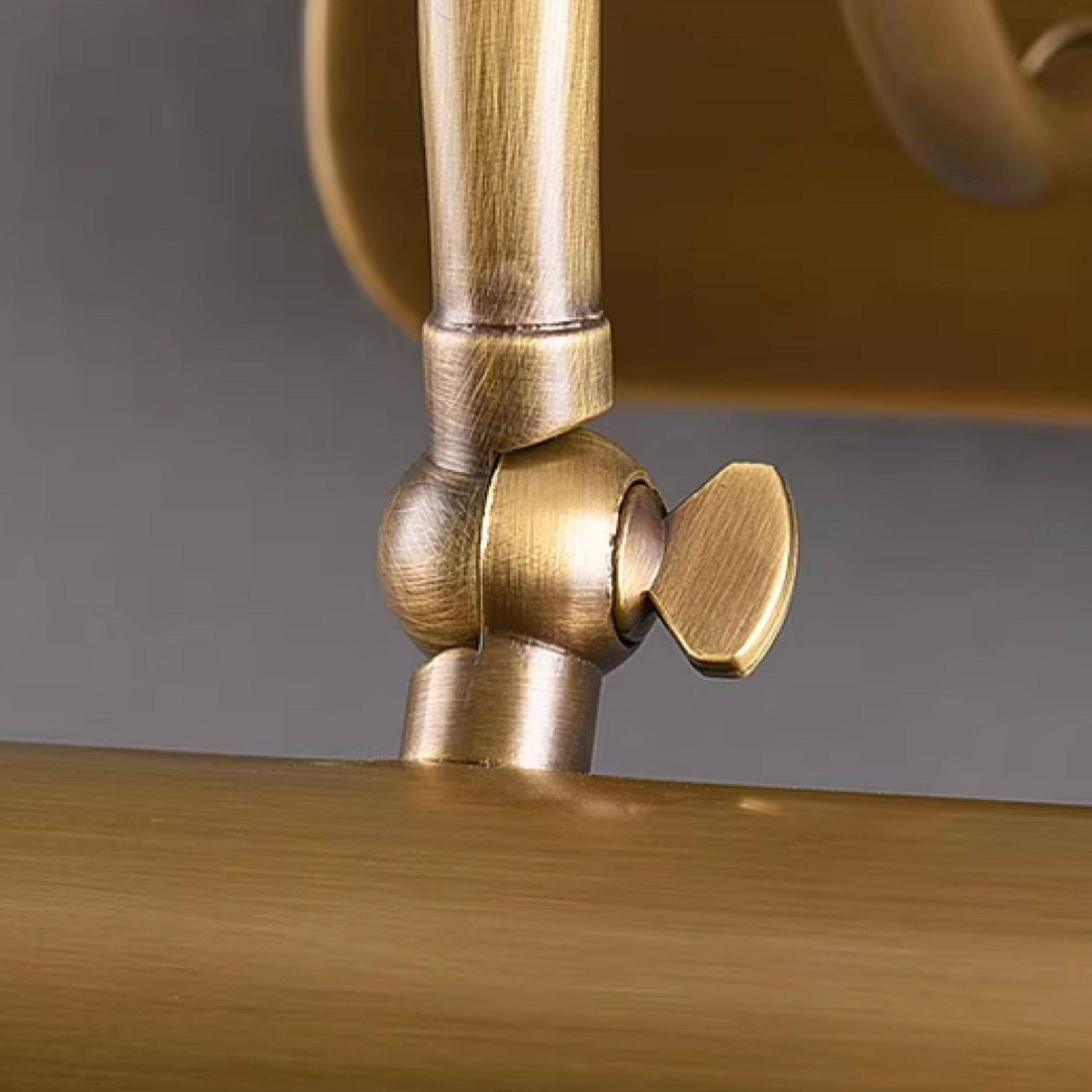 Montgomery Antique Brass Vanity Sconce