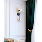 Nicole Balanced Glass Globe Wall Sconce