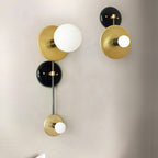 Nicole Balanced Glass Globe Wall Sconce