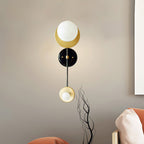 Nicole Balanced Glass Globe Wall Sconce