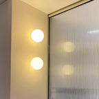 Orbique: Modern Sphere Wall Light – Round Glass Lamp in Minimalist Design