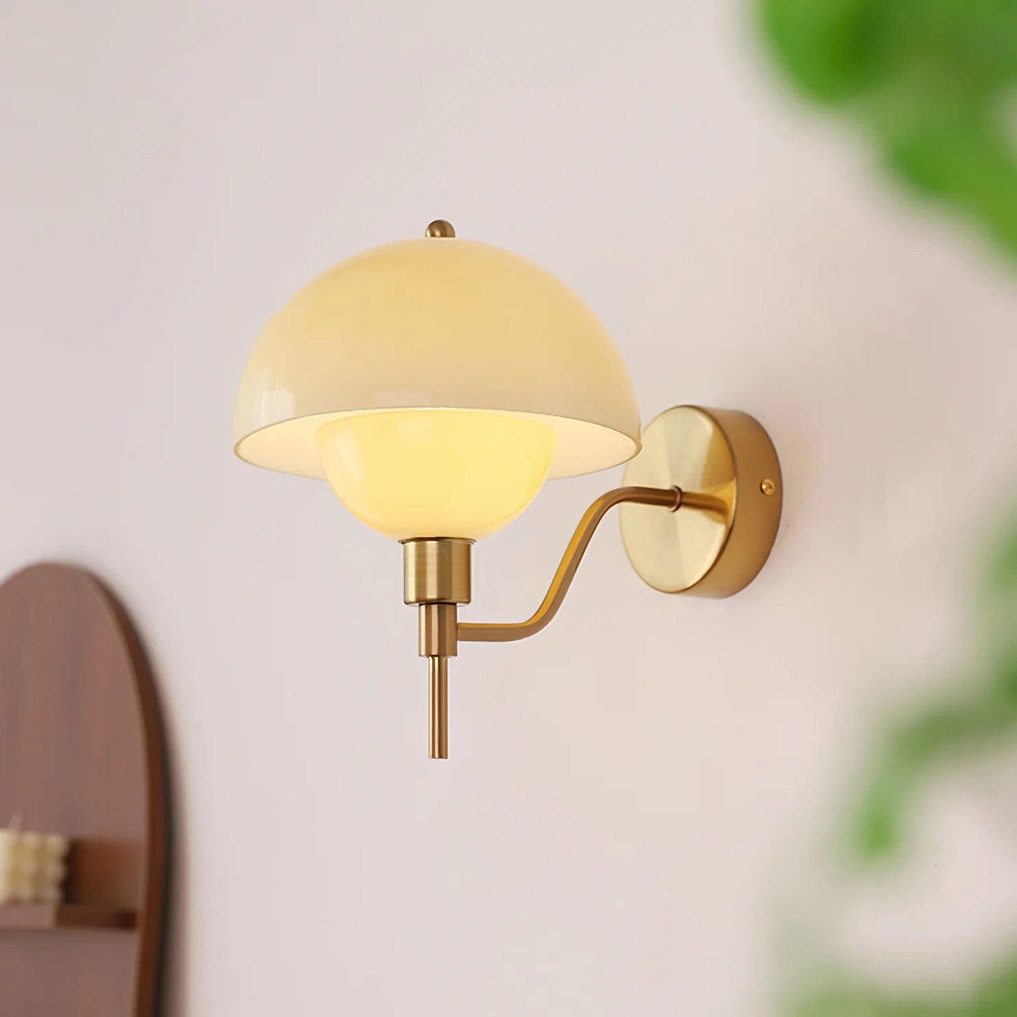 Ruhi Glass Orb Curved-Arm Wall Lamp