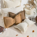 Celestine – Knitted Decorative Pillow With Pom-Poms