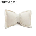 Celestine – Knitted Decorative Pillow With Pom-Poms