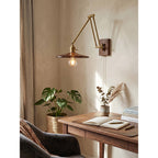 Layered Disc & Ring Wall Sconce with Adjustable Arm