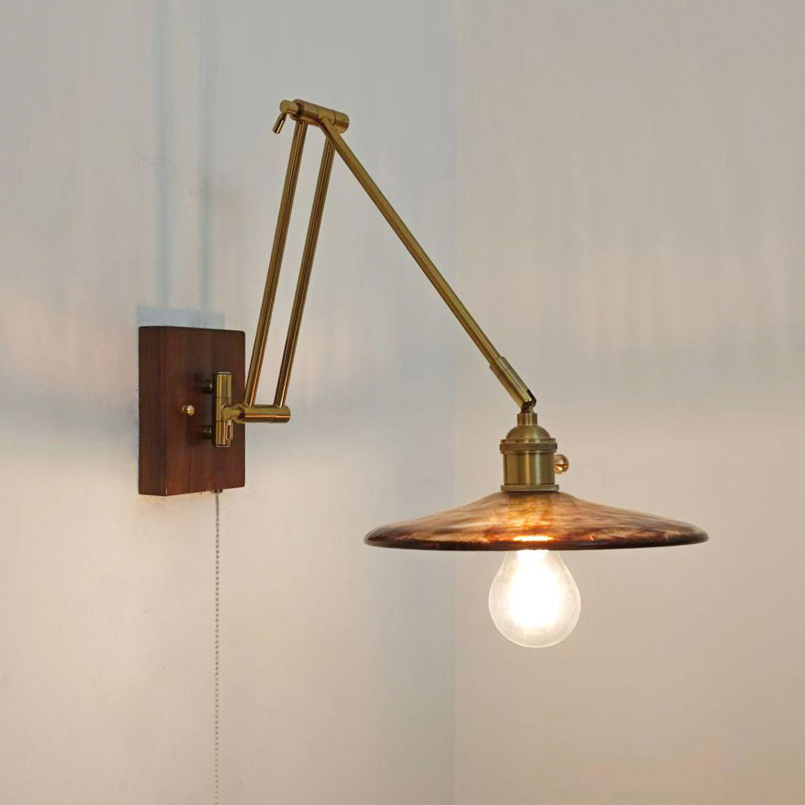 Layered Disc & Ring Wall Sconce with Adjustable Arm