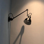 Adjustable Swing-Arm Task Wall Light in Matte Black