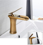 VetroLux: Elegant Sink Faucet – Golden Fixture for a Modern Bathroom Environment