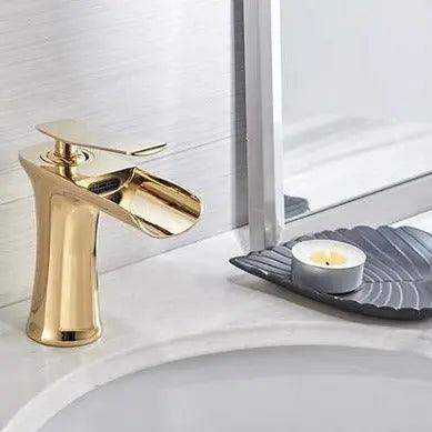 VetroLux: Elegant Sink Faucet – Golden Fixture for a Modern Bathroom Environment