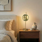 Curved-Stem Brass Table Lamp with Green Glass Shade