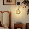Bela Rattan Wall Lamp | Handwoven Shade, Adjustable Arm