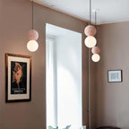 OrigoGlow: Pendant Light with Ball Structure Made of Cement & Opal Glass – for Entrance Area & Sofa Corner