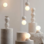 OrigoGlow: Pendant Light with Ball Structure Made of Cement & Opal Glass – for Entrance Area & Sofa Corner