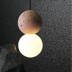 OrigoGlow: Pendant Light with Ball Structure Made of Cement & Opal Glass – for Entrance Area & Sofa Corner