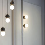 OrigoGlow: Pendant Light with Ball Structure Made of Cement & Opal Glass – for Entrance Area & Sofa Corner