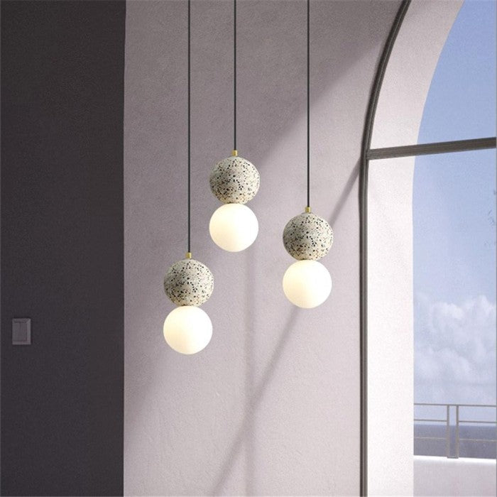 OrigoGlow: Pendant Light with Ball Structure Made of Cement & Opal Glass – for Entrance Area & Sofa Corner