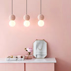 OrigoGlow: Pendant Light with Ball Structure Made of Cement & Opal Glass – for Entrance Area & Sofa Corner