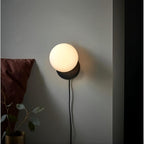 OrigoGlow: Pendant Light with Ball Structure Made of Cement & Opal Glass – for Entrance Area & Sofa Corner