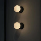 OrigoGlow: Pendant Light with Ball Structure Made of Cement & Opal Glass – for Entrance Area & Sofa Corner