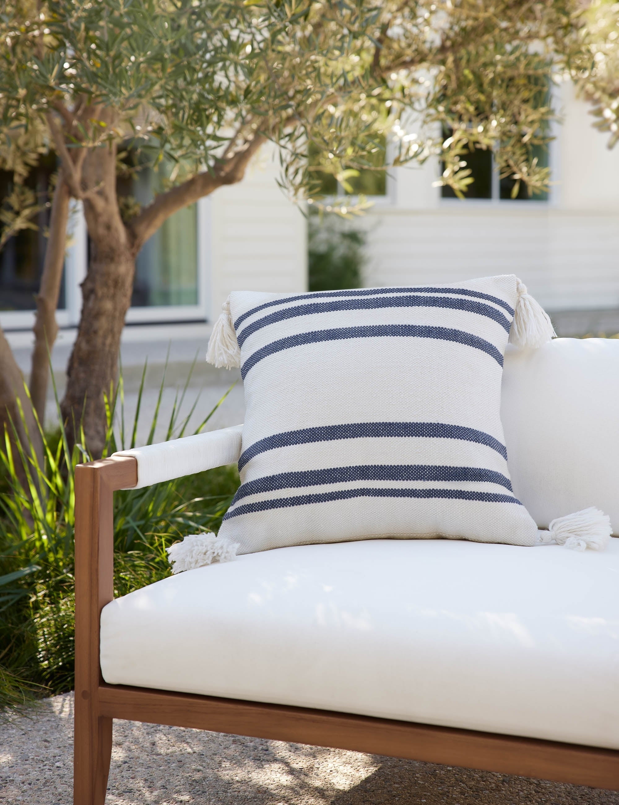 Fino Decorative Pillow | Weather-Resistant, Tasseled Corners